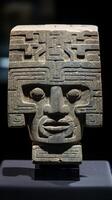 ancient carved stone sculpture with intricate patterns and facial features photo