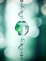 Sparkling crystal ball with green reflection photo