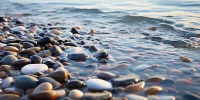 Tranquil beach scene with smooth pebbles and rippling waves photo