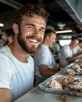 Happy chef smiling while serving delicious gourmet food photo
