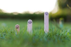 close up of smiling emoji on a popsicle stick as a concept of the spirit of life photo