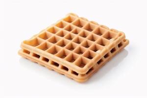 Close-up of a single, crispy waffle isolated on a white background. photo