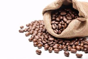 Coffee beans spilling from a burlap sack. photo