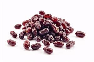 Close-up of a pile of dried dates on a white background. photo