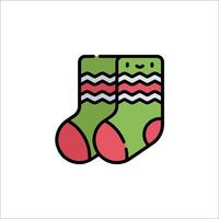 A pair of socks with a red and green pattern vector