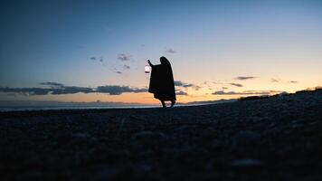 Shadows and Waves Envelop the Seeker Path photo
