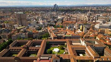 Drone photo University of Milan during Milano Design Week 2024. Multidisciplinary university occupying several historical buildings, with a botanical garden and an observatory. Italy,Milan 20.04.2024