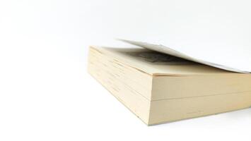 stack of colorful books on white background, open book, stack of books isolated on background, education, read, study, school, library, dictionary. photo