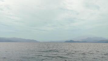 beautiful view of the tropical beach of Pahawang Island, Lampung. Landscape in the highland natural park. Panoramic view by the sea. photo