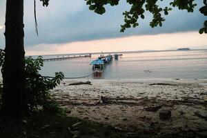 Traditional Indonesian fishing boats, boats and vessels in the waters of the Lampung region, Indonesia photo