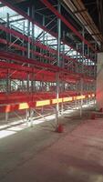 Logistics warehouse concept with empty high pallet racks, shelving system video