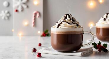 Two hot chocolate mugs with whipped cream and chocolate photo
