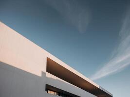 A building with a sky background and clouds photo