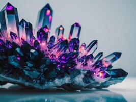 A cluster of crystals with purple lights photo