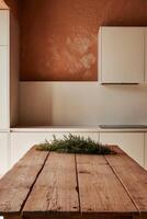 A wooden table in a kitchen with a red wall photo