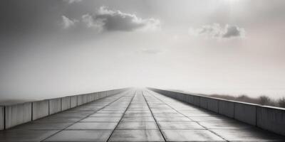 A long walkway with a sky and clouds in the background photo