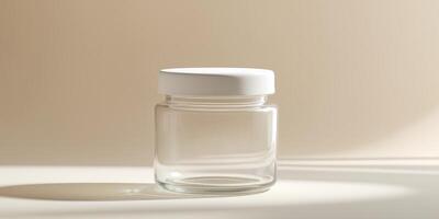 Clear jar mockup with white lid on soft background for product labeling and packaging design concepts photo