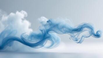 Flowing blue smoke creates a calming abstract background with gentle curves and elegance photo