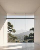 Empty room with large windows and mountains in the background photo