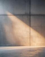 An empty room with concrete walls and a light shining through photo