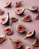 Fresh figs sliced on a pink backdrop creating a vibrant and appetizing display for culinary inspiration photo