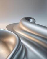 A silver metal object with a curved surface photo