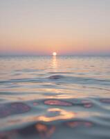Sunset reflection over calm ocean waters coastal serenity nature scene photo