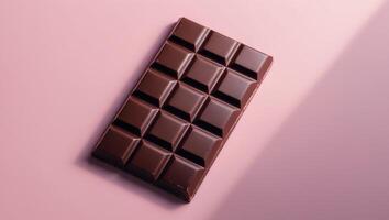 Smooth Dark Chocolate Bar on Pink Background with Glossy Finish photo