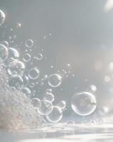 Bubbles of soap are floating in the air photo