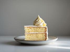 A slice of cake on a plate with a white background photo