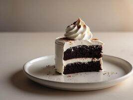 A piece of cake on a plate with whipped cream photo
