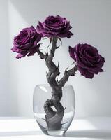 Three purple roses in a vase on a table photo