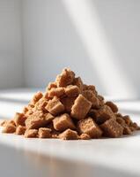 Pile of Brown Sugar Clumpy moist with a caramel hue photo