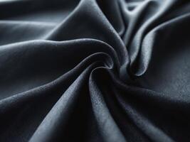 Dark Fabric Texture with Elegant Ripples and Folds photo