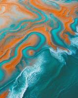 Abstract Aerial View of Turquoise and Orange Ocean Shoreline Texture photo