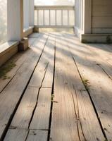 A wooden porch with a sun shining on it photo
