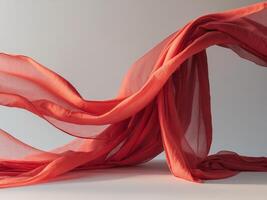 A red silk fabric is blowing in the wind photo