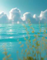Serene underwater scene with vibrant blue ocean and clouds photo
