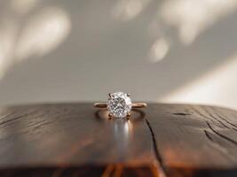 Sparkling Diamond Ring on Polished Wooden Surface photo