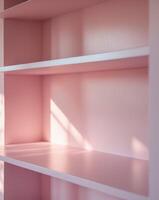 a close up of a pink empty shelf in a pink room photo
