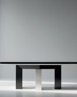 there is a black table with a white base on a gray background photo
