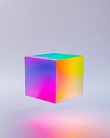 A cube with a rainbow colored light shining through it photo