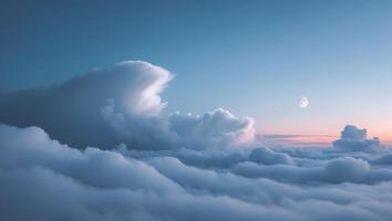 A view of the clouds and the moon over the ocean photo