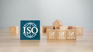 ISO standards quality control certification concept. Quality warranty and assurance. Quality Management for Business and Company for International Standards Organization Control QA. Wooden blocks photo
