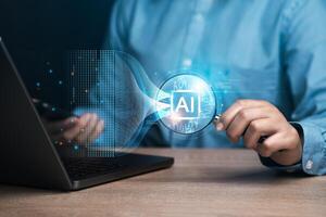 Businessman using AI tools, intelligent robot technology Learning of digital chatbot tools Future and global connectivity innovations to enable access to information and online networks. photo