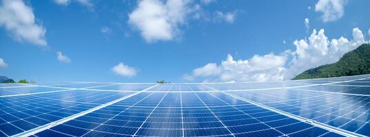 Solar panels, renewable energy concept, solar energy and green energyof clean electricity generation that is environmentally friendly. Large solar panels on a bright sky background. photo