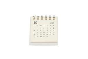 Simple desk calendar for OCTOBER 2025 isolated on white background. Calendar concept with copy space. 2025 OCT calendar. photo