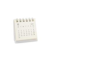 Simple desk calendar for JUNE 2025 isolated on white background. Calendar concept with copy space. 2025 JUN calendar. photo