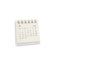 Simple desk calendar for APRIL 2025 isolated on white background. Calendar concept with copy space. 2025 APR calendar. photo