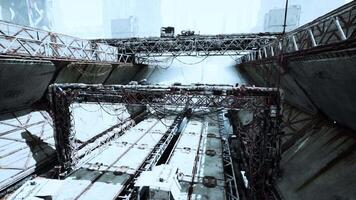 Ruins of an old destroyed oil terminal with rusted structures and decay video
